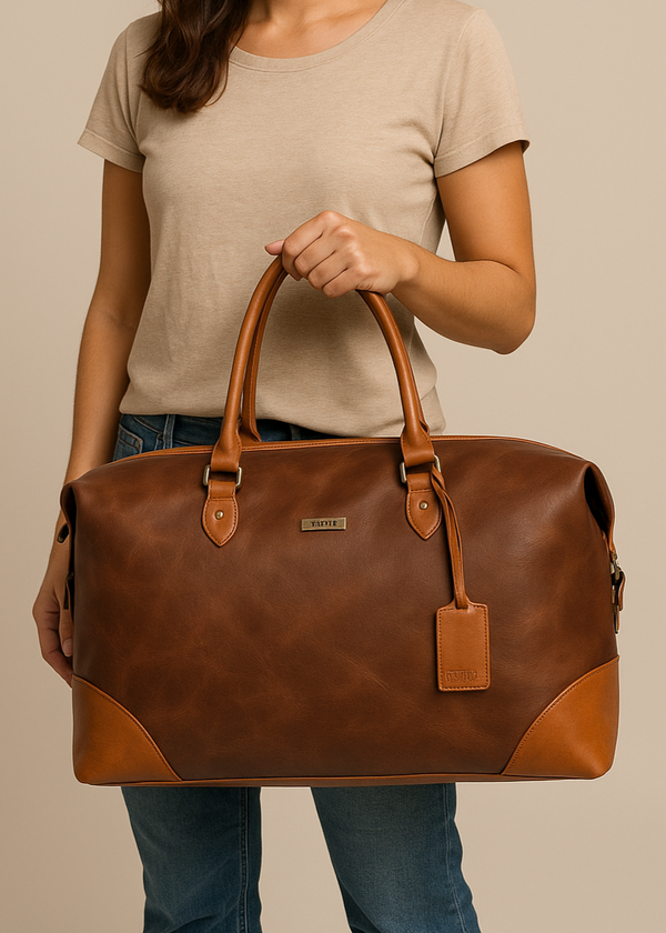 Woman holding a brown leather bag against a beige background